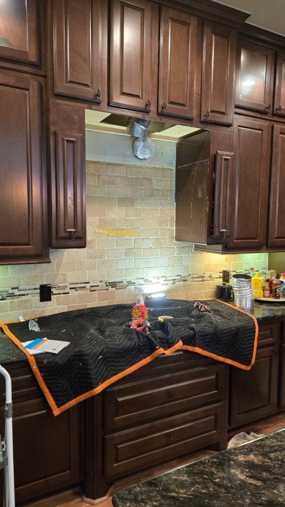 Custom Range Hood Cabinet Enclosure Build in Houston — carpentry services